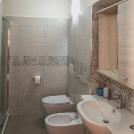 Large bathroom with shower cubicle